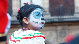 image of a child with their face painted