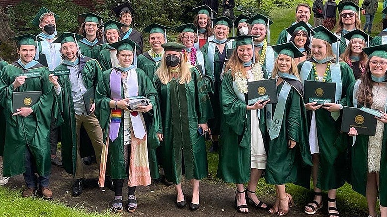 group of College of Education graduates posing for the camera