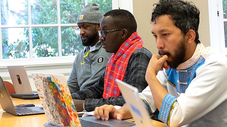 image of students in EPoL classroom working on laptops