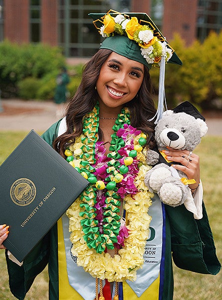 image of UO CDS student Melodi Lagandaon in cap and gown