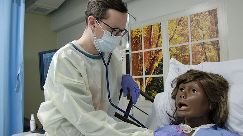 image of a student working in the Communication Disorders and Sciences lab