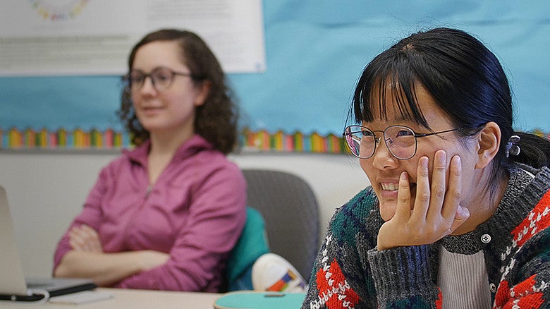 image of individuals in a classroom setting