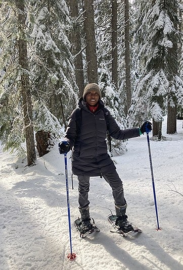 image of Lew Williams on skis in the snow