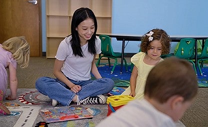 Mia Ly in the Sibling Support Clinic with young individuals