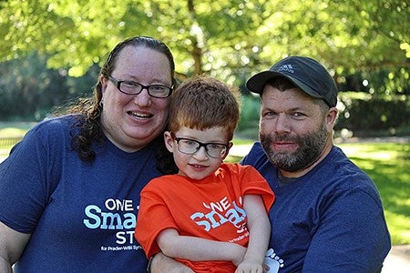 Rachel Allyne Barrong-Aazzerah with son and husband