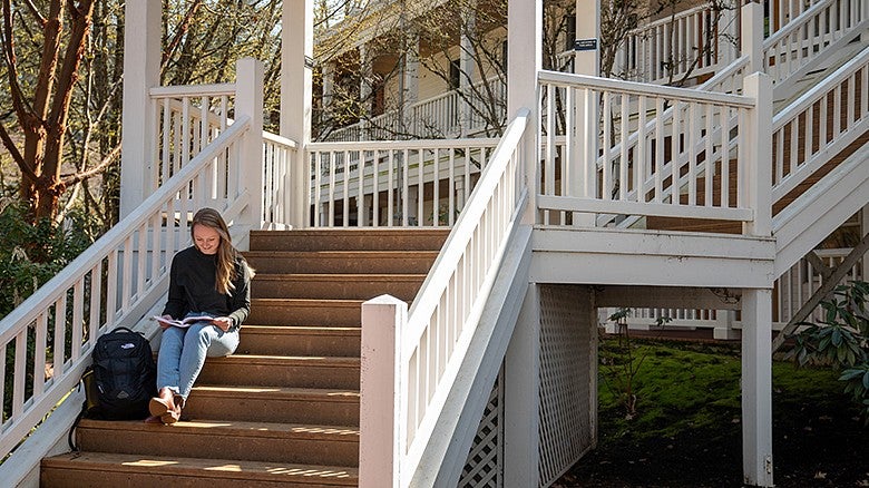 image of student on stairs in Lokey