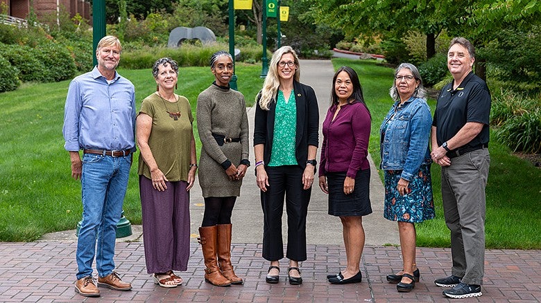 Dean's Executive Leaders standing in a group posing for the camera