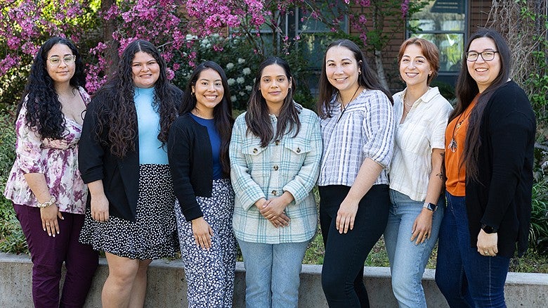 CPSY 2022 Cohort facing camera posing for a photo