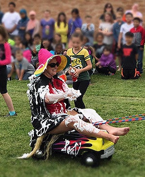 Kate Barker at a car wash with her students