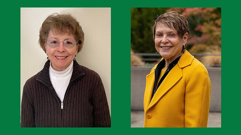 two individuals posing for camera