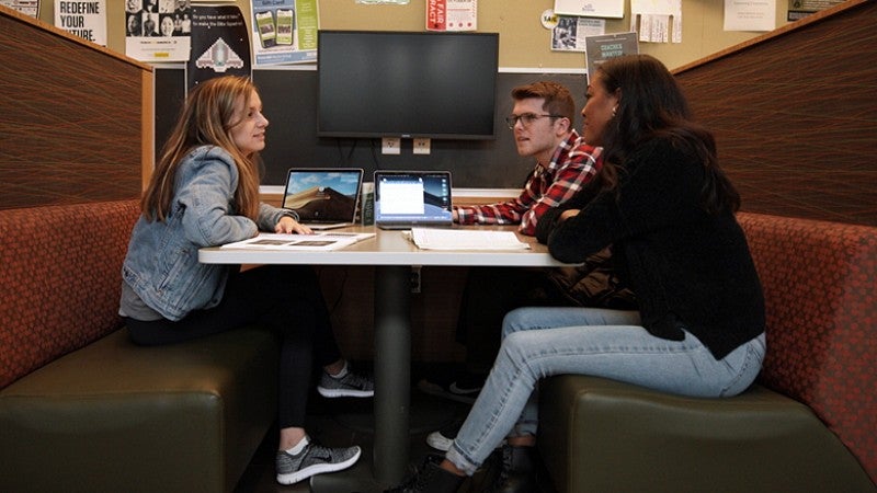 University of Oregon College of Education students in discussion in HEDCO extended lobby