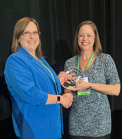 Emily Tanner-Smith, PhD accepting SPR Fellow award