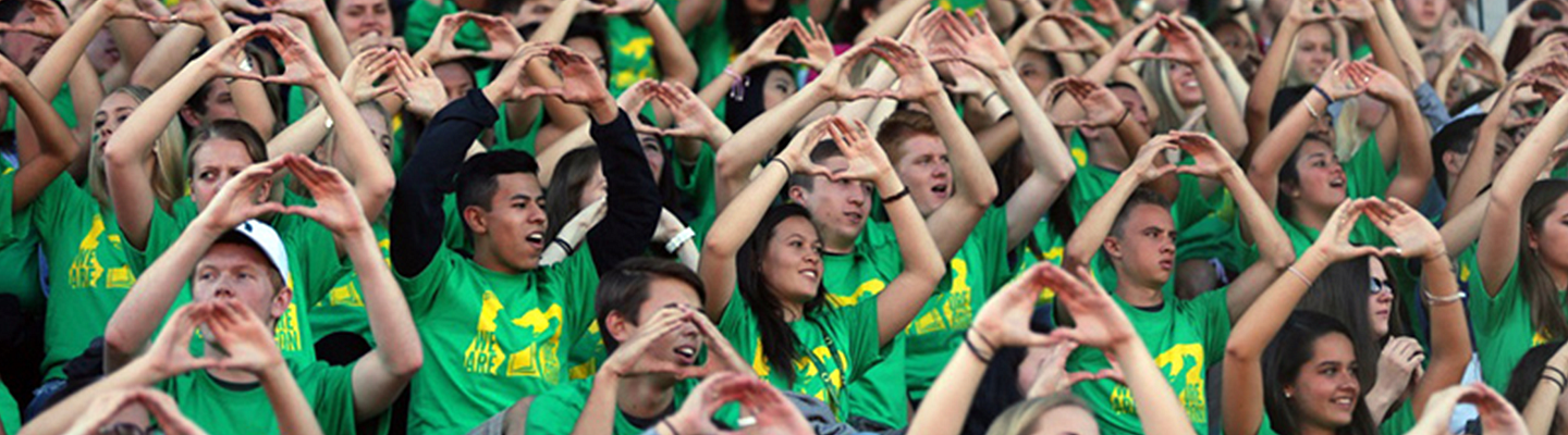 University of Oregon Students flashing Oregon O sign 1440 x 400