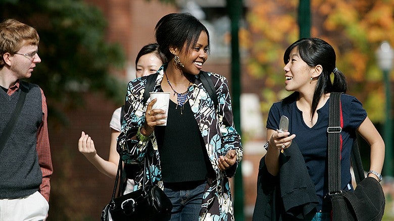 University of Oregon students walking and talking
