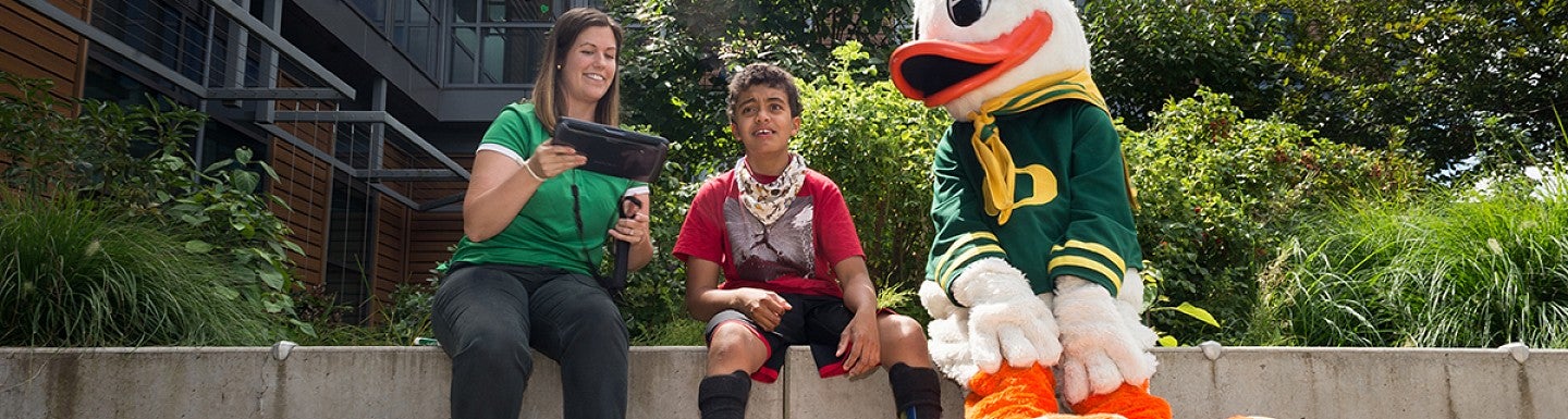University of Oregon College of Education students with the duck mascot